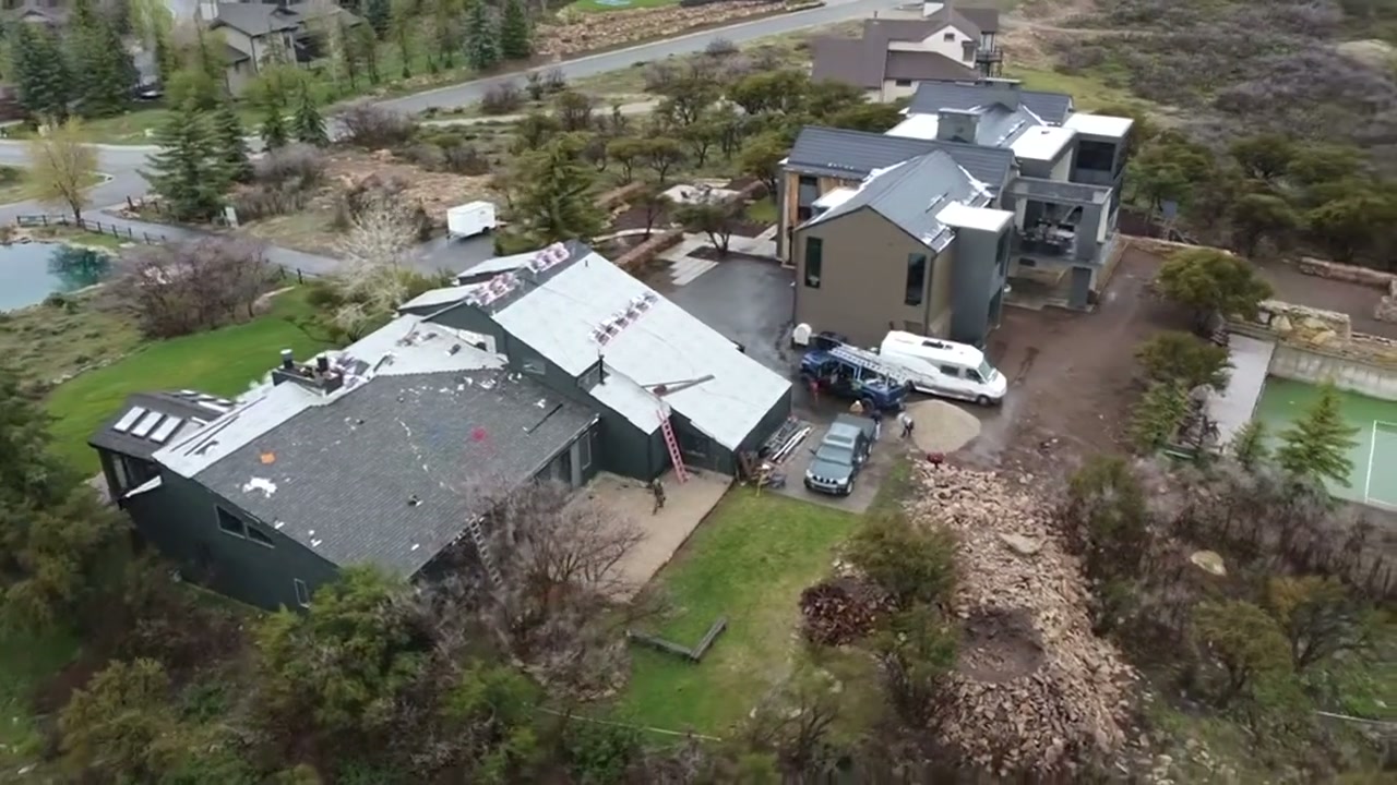 RoofWise crew working on a Northern Utah roof